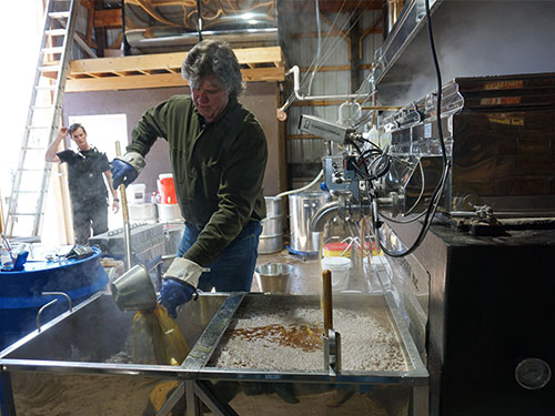 Jesse Paul Checking the Syrup sugar content